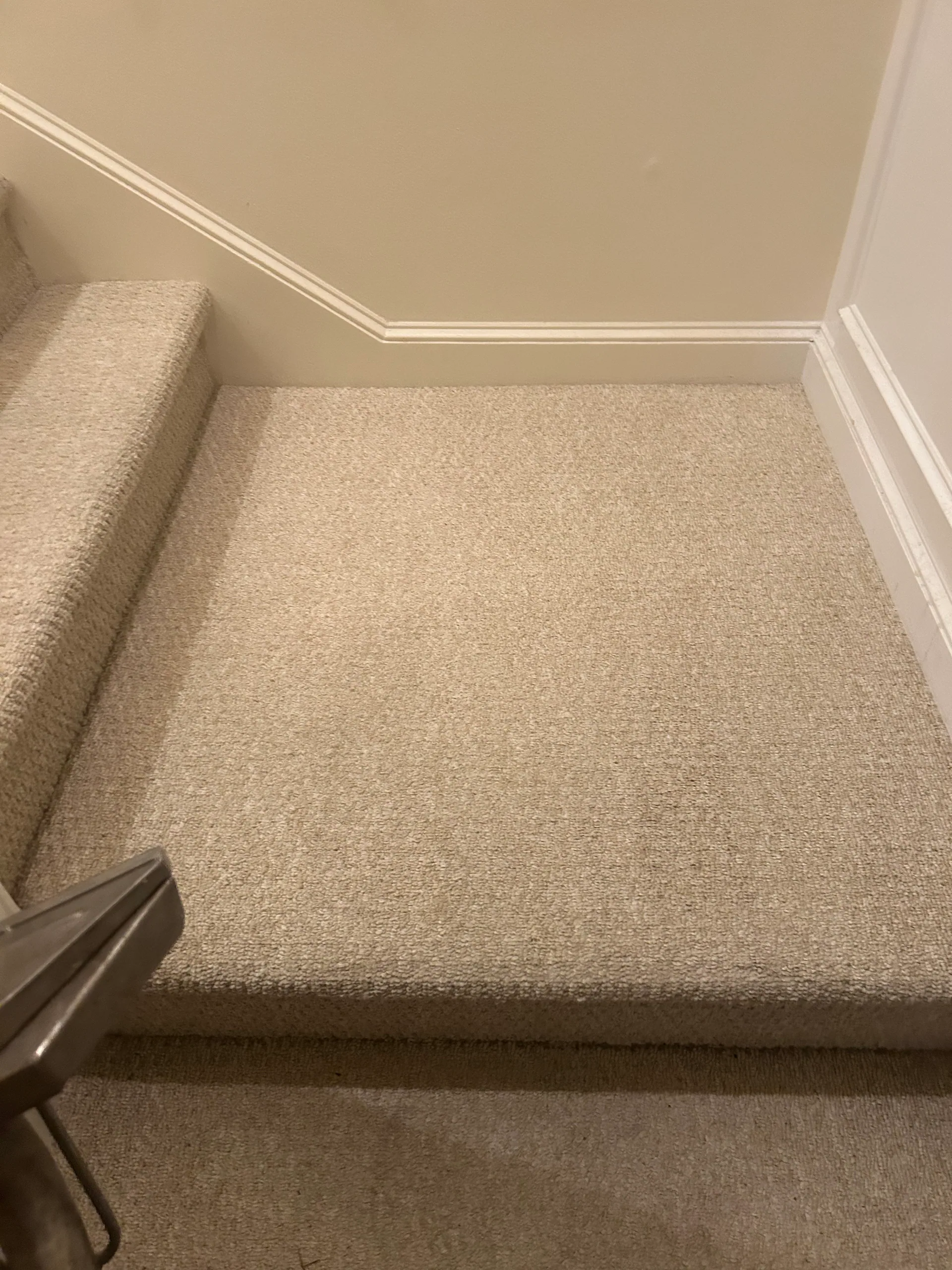 beige carpeted stair landing wand tip white trim wentzville