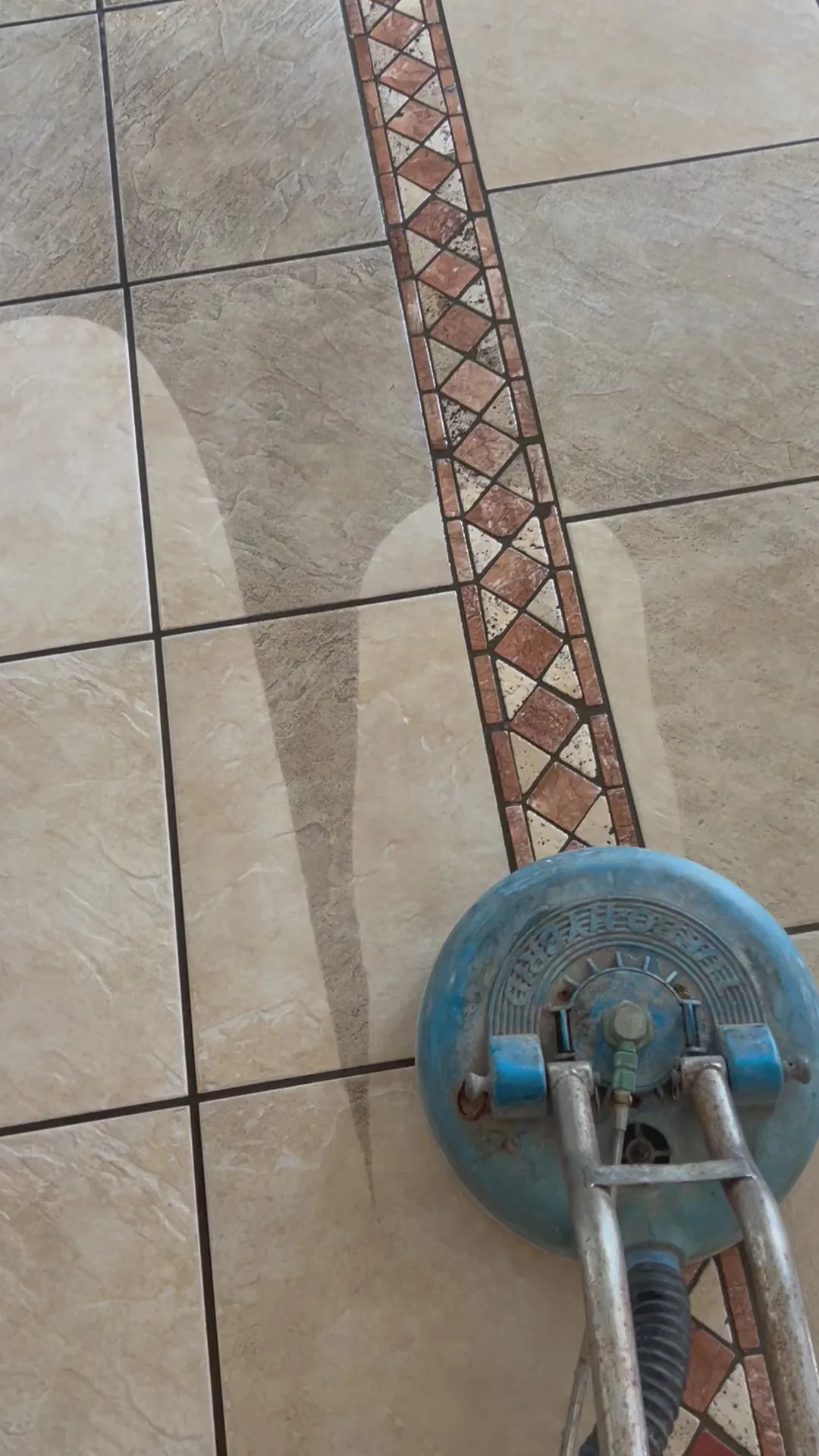beige stone tile mosaic diamond border blue spinner arcs cot