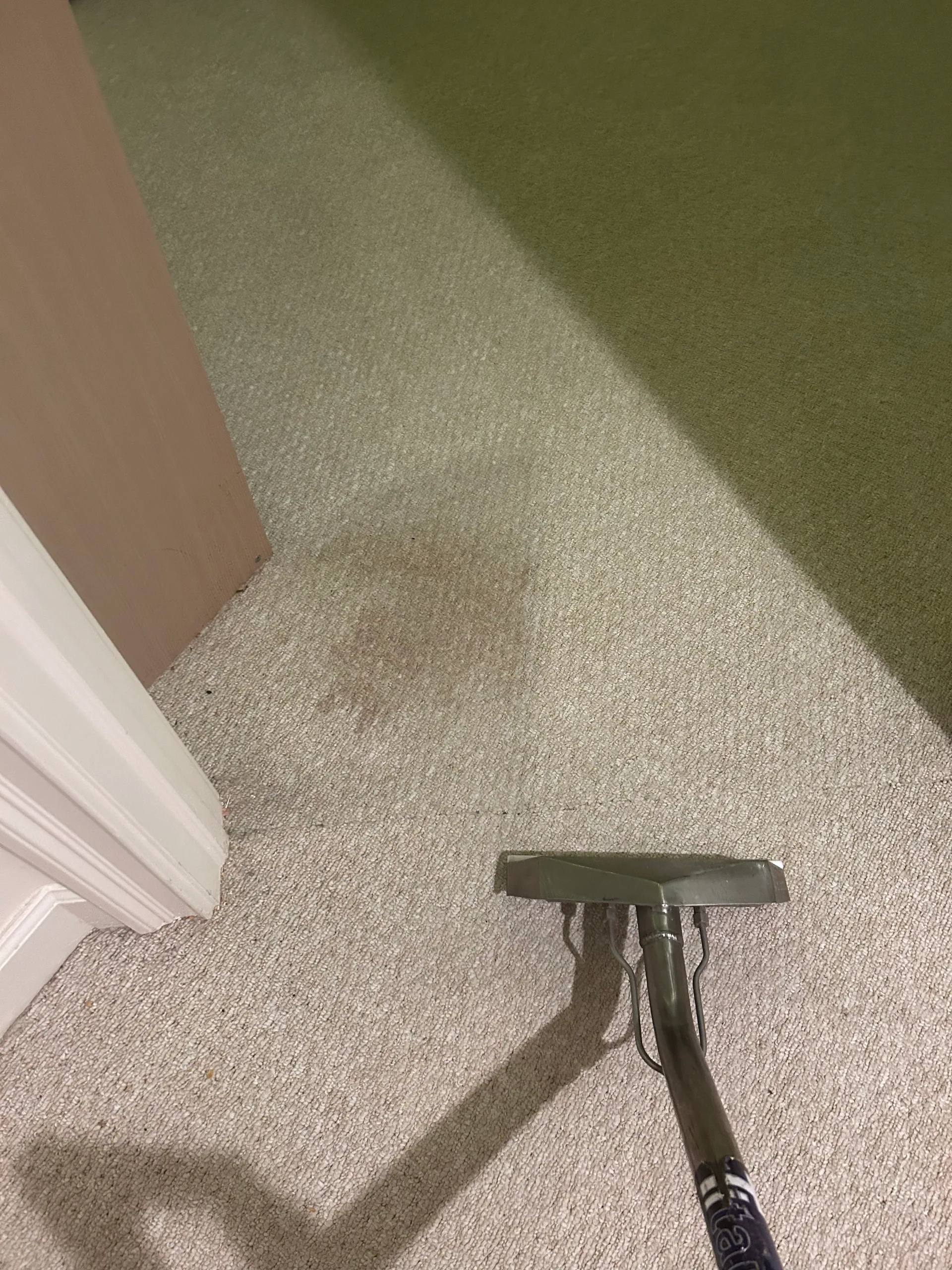 brown stain cream carpet doorway wand
