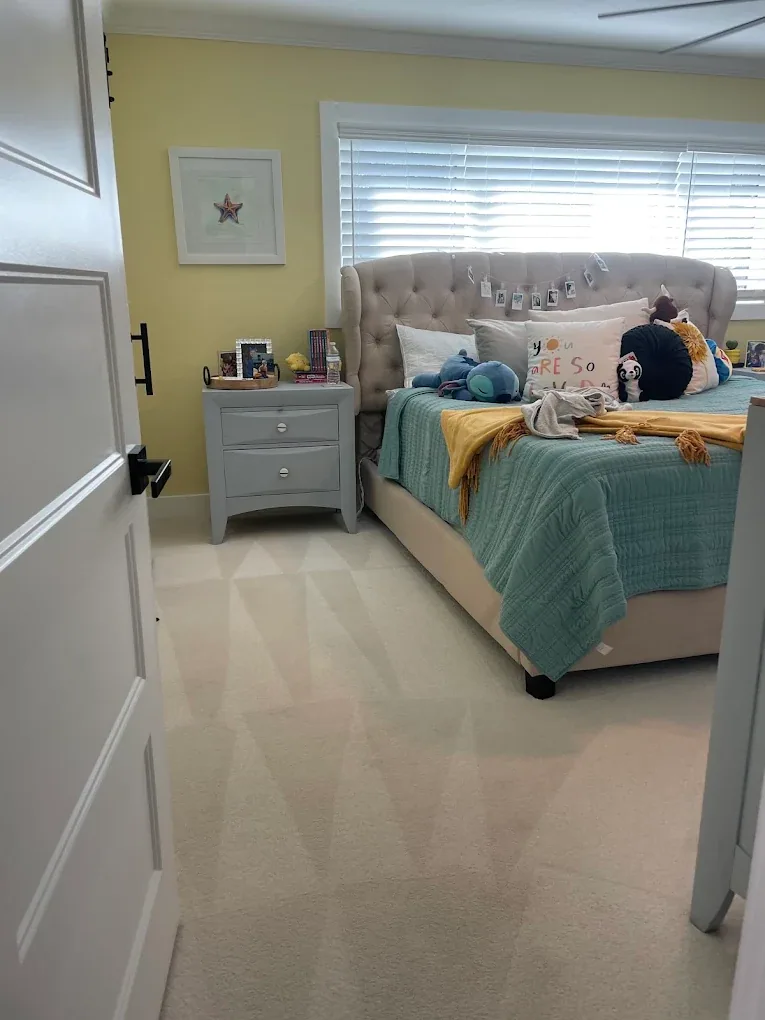 cream carpet wand strokes yellow bedroom tufted headboard te