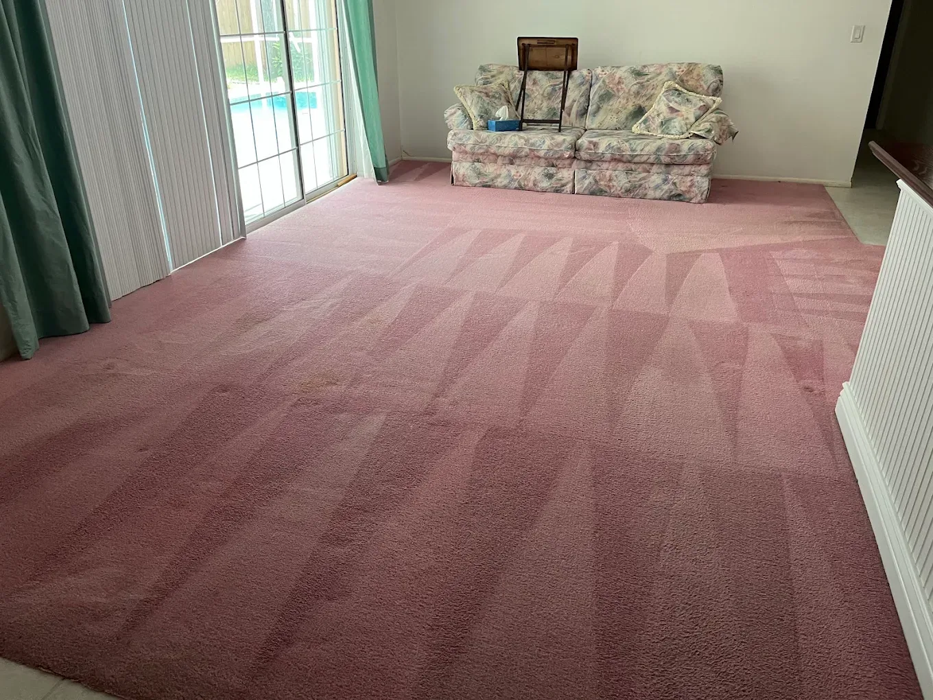 dusty rose carpet wand strokes floral loveseat pool view st
