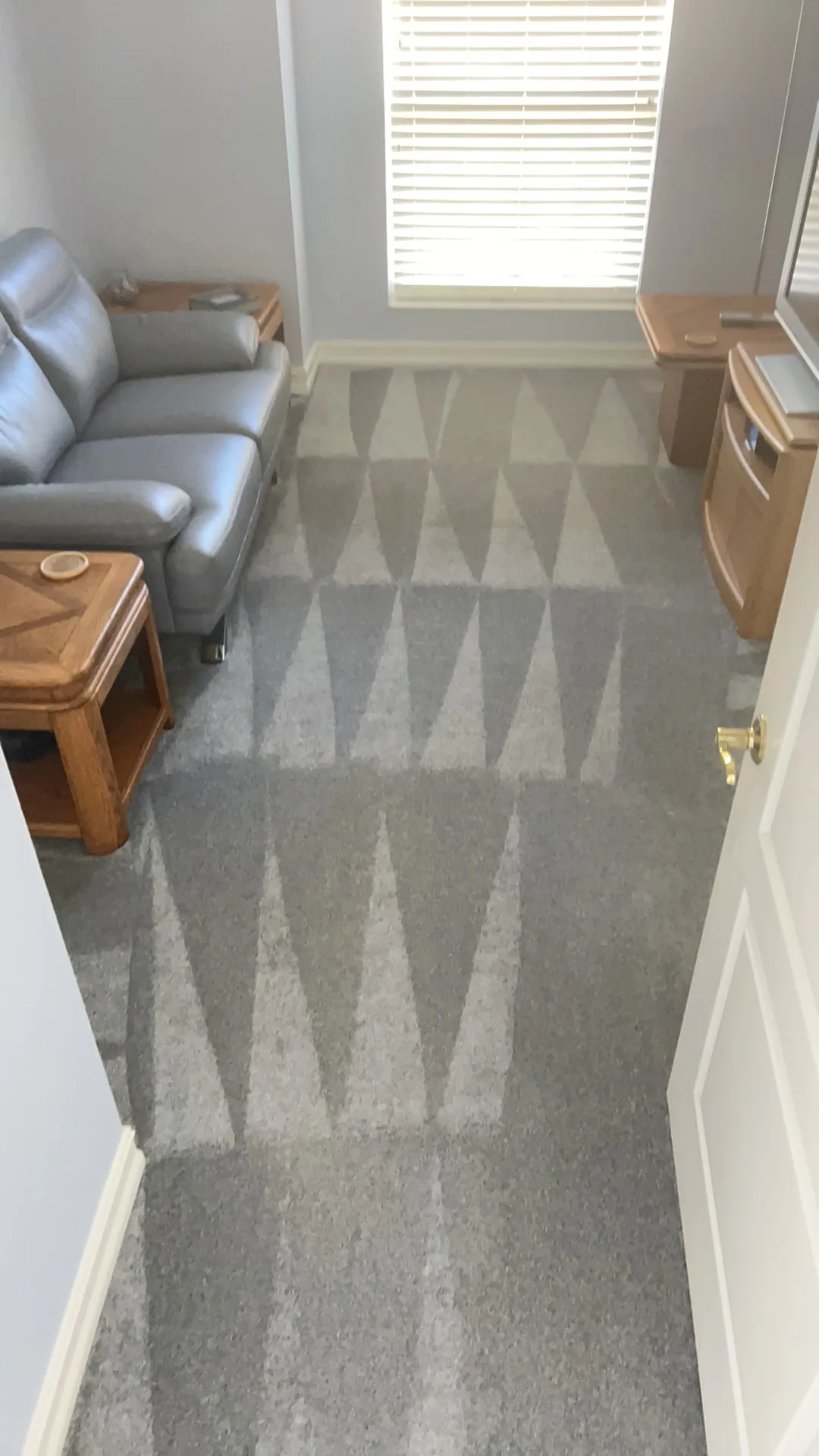 gray carpet wand stroke pattern gray leather loveseat