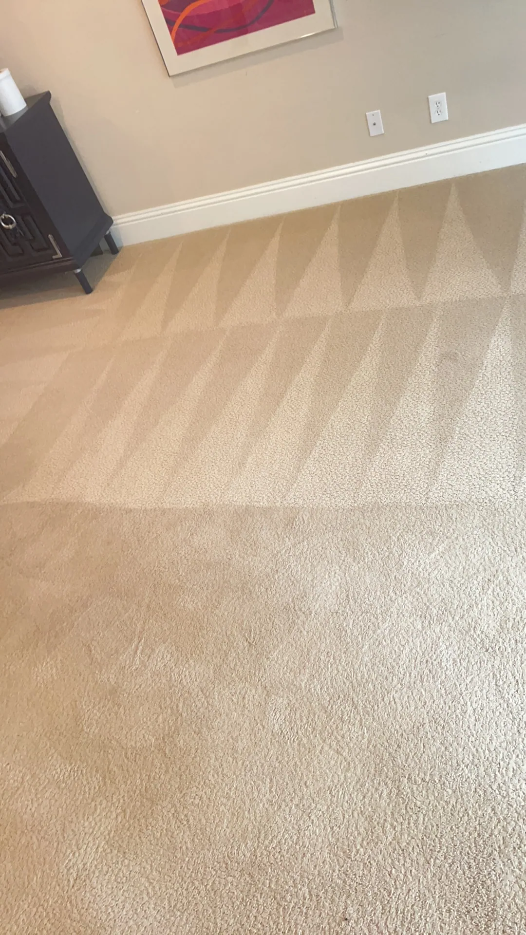 tan carpet triangle wand strokes black dresser abstract art