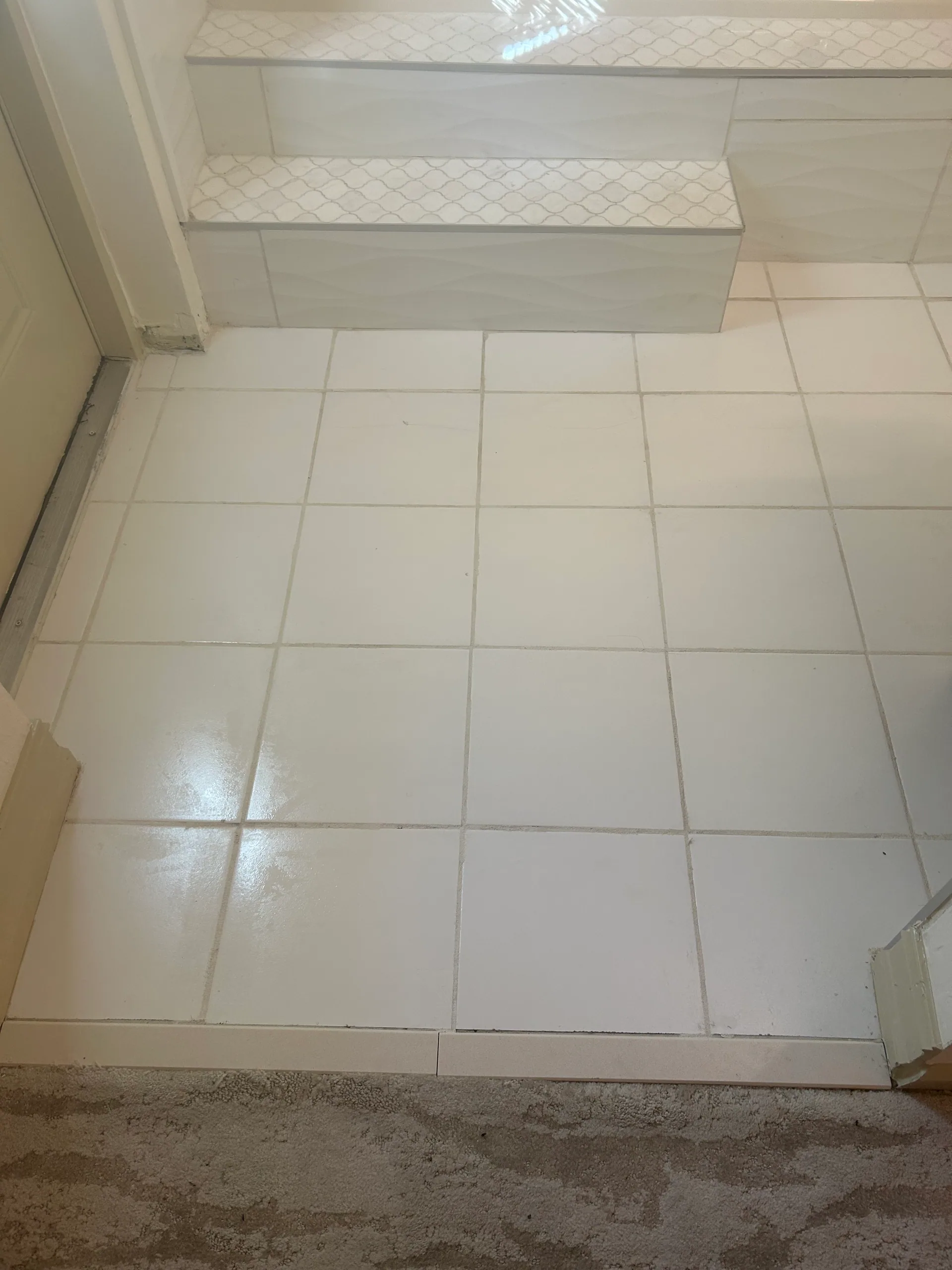 white bathroom tile mosaic tub steps